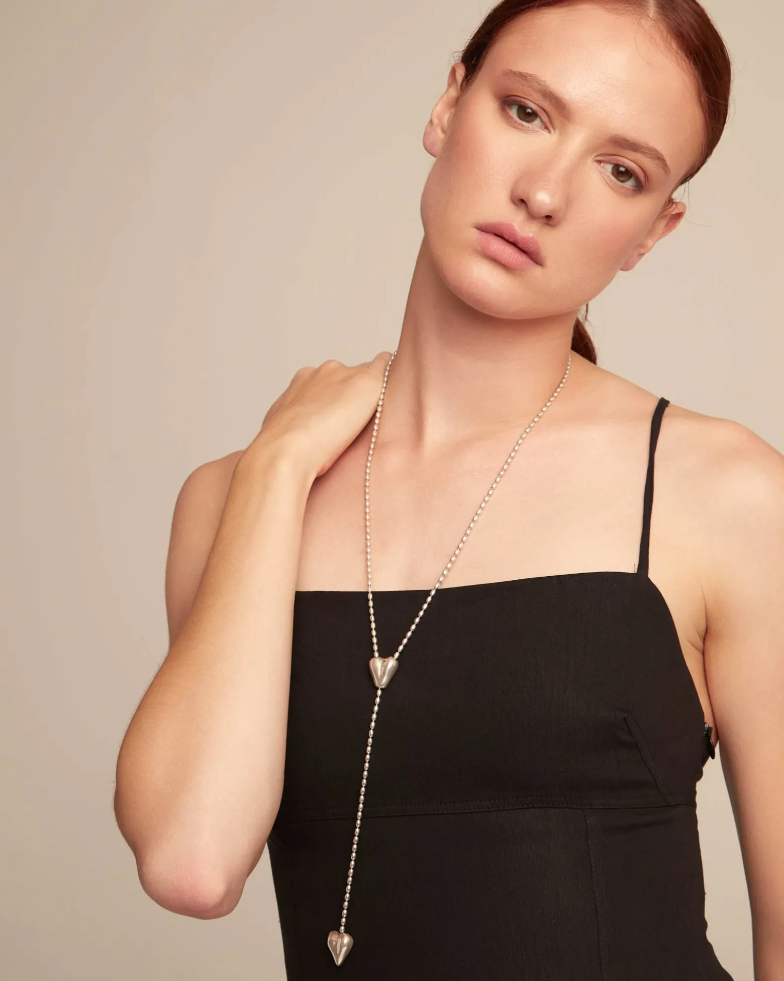 Long adjustable chain necklace with two hearts