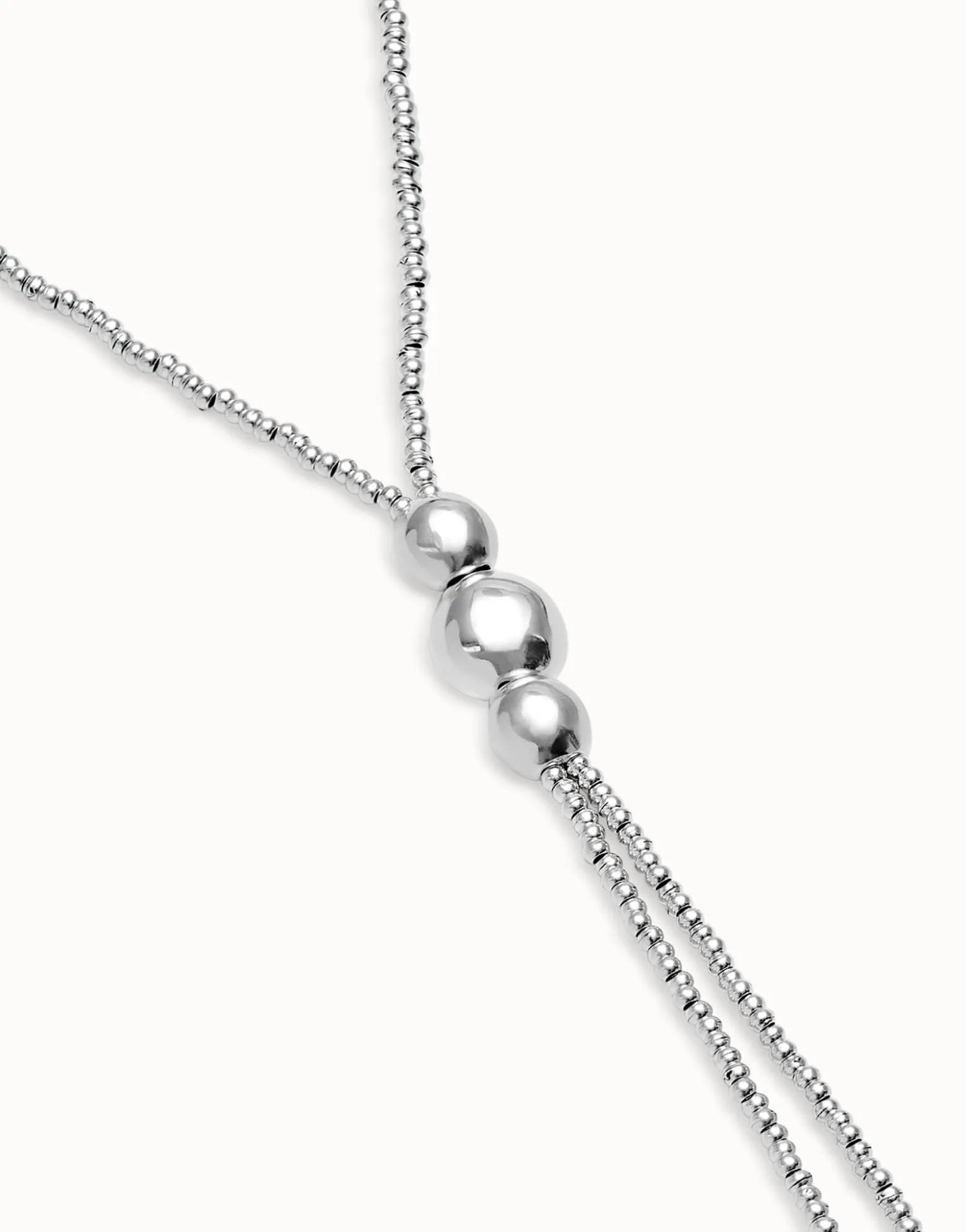 Long bead necklaces with three large central beads