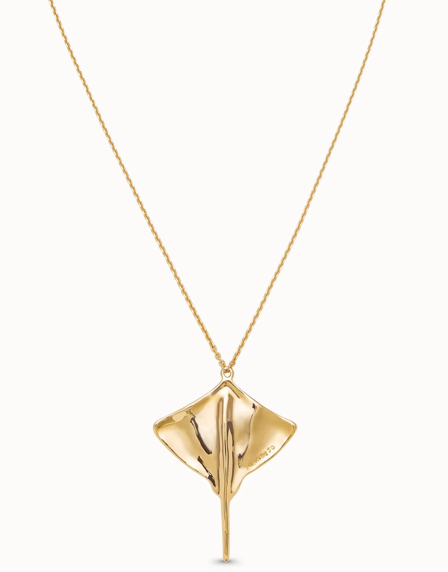 Long chain pendant necklace with manta ray