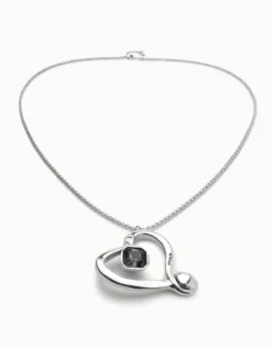 Long chain pendant necklace with a large heart