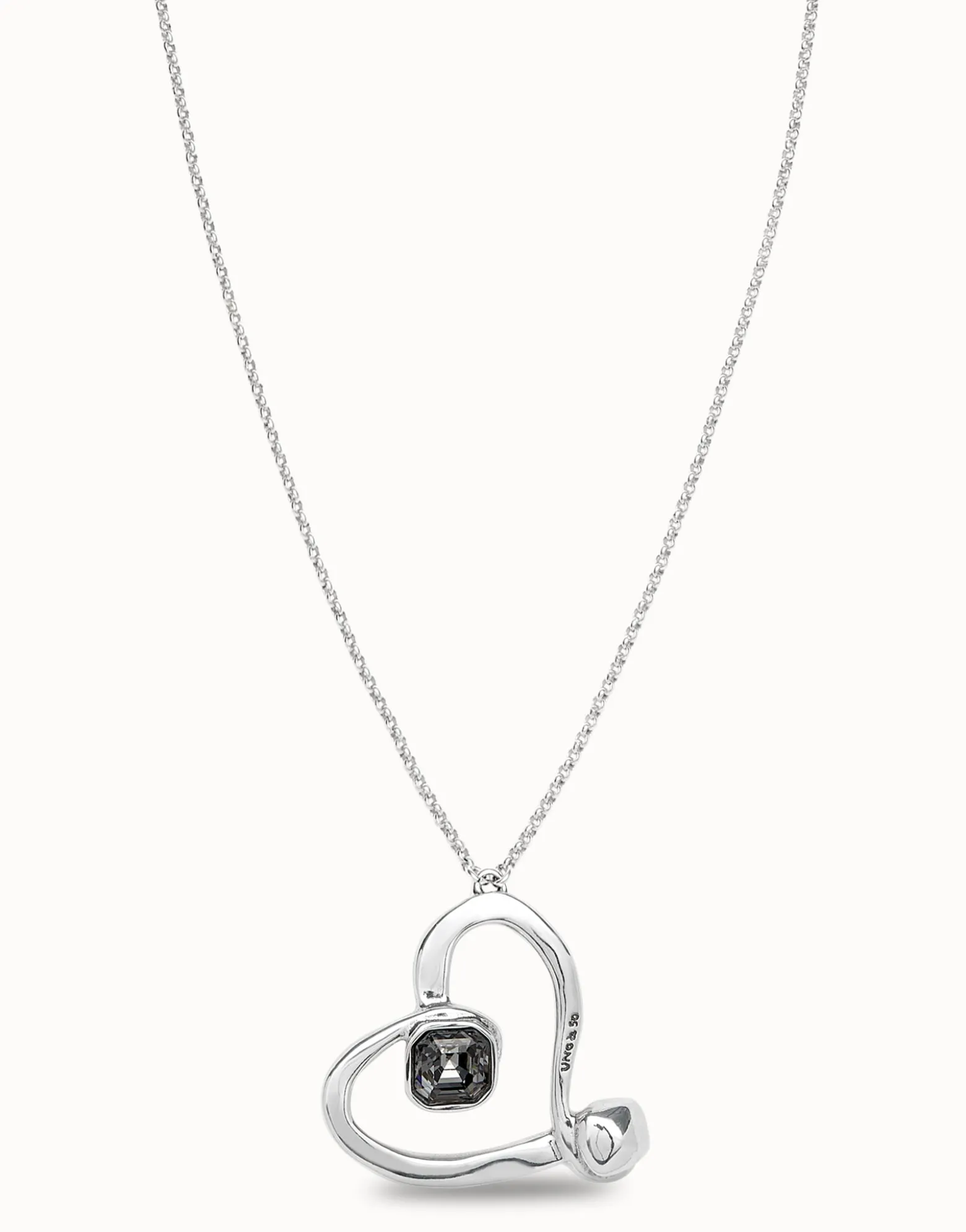 Long chain pendant necklace with a large heart