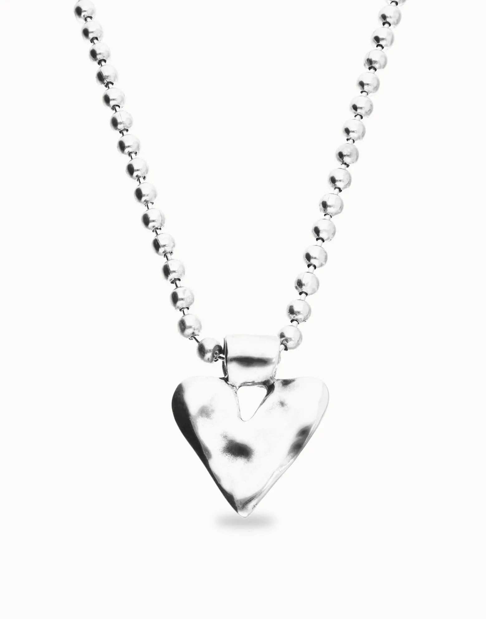Long necklace with beads and heart detail