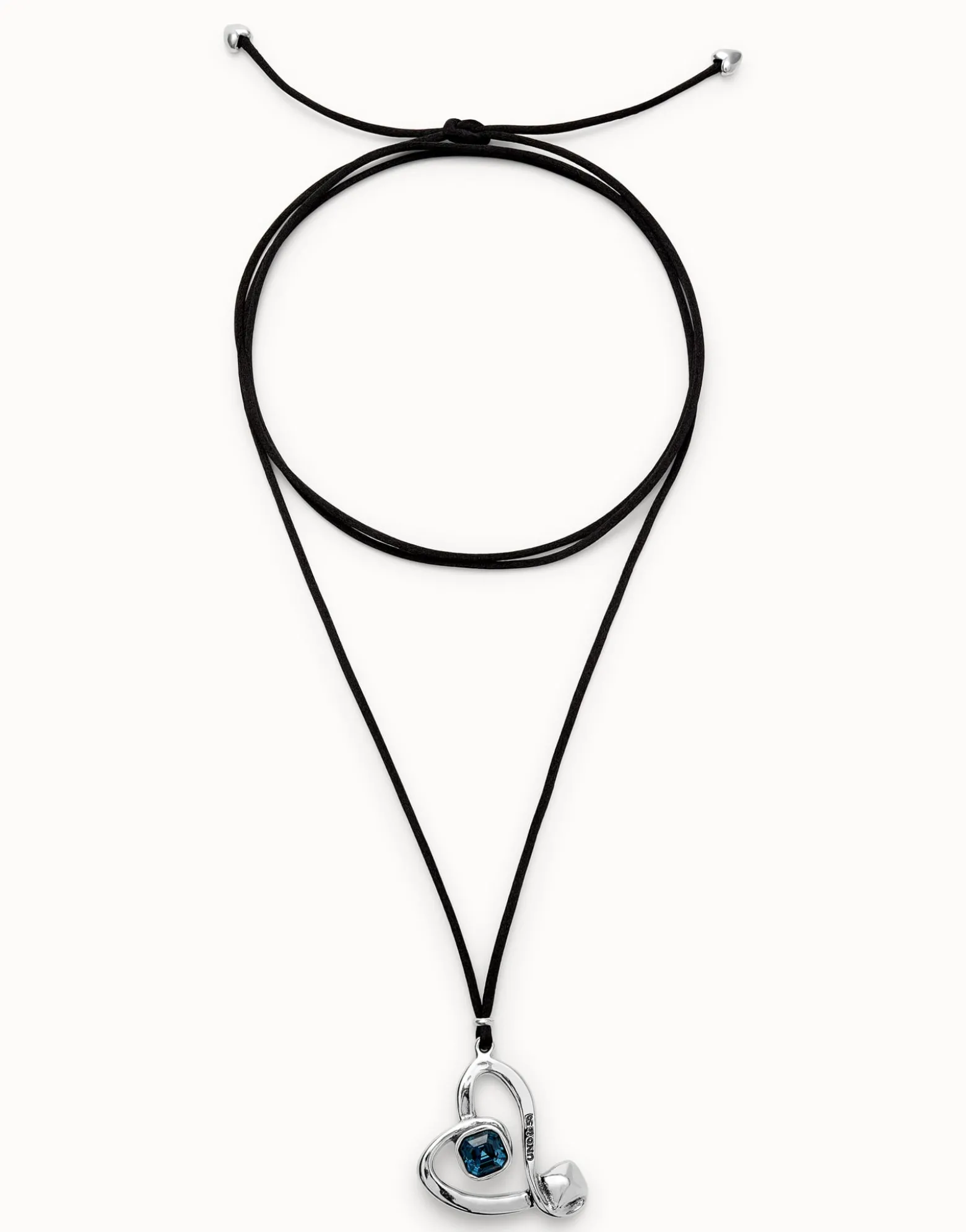 Long pendant and central heart with blue crystal