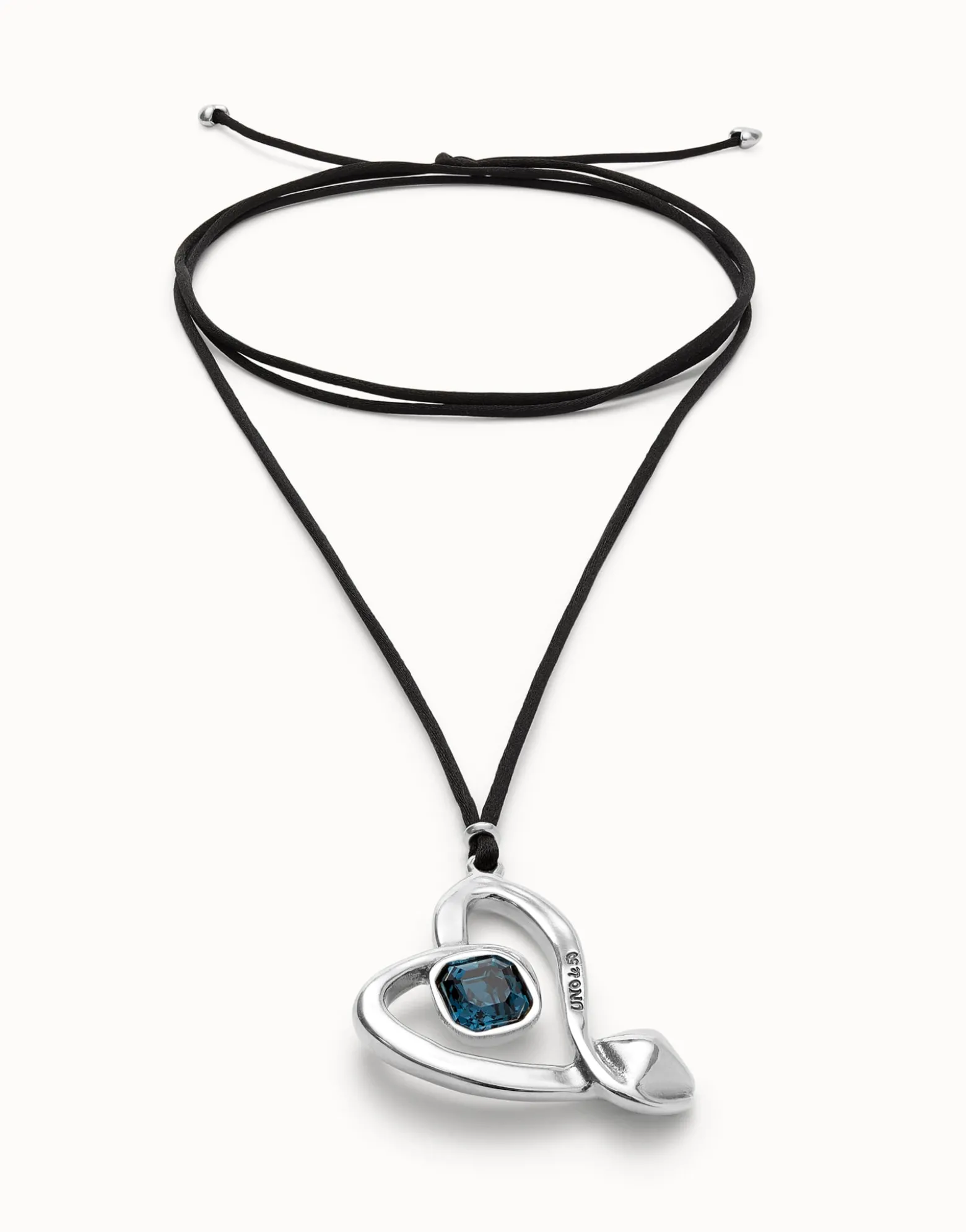 Long pendant and central heart with blue crystal