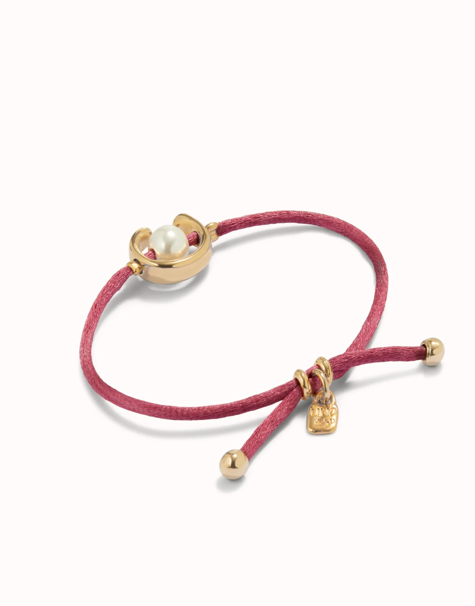 Mauve cord bracelet with a pearl