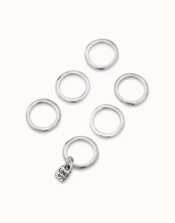 Multi row ring with a charm