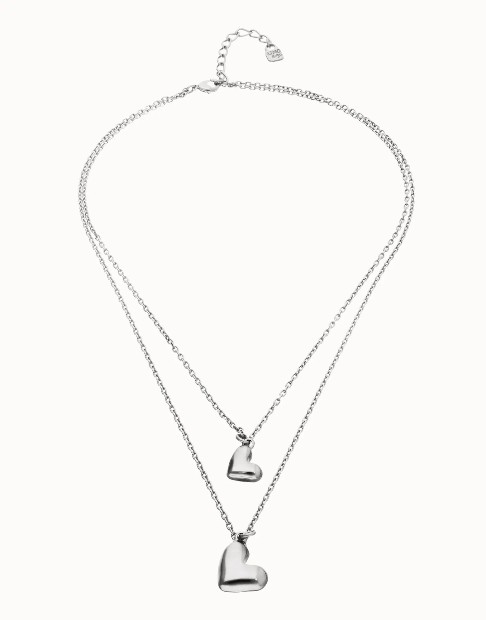 Multi strand chain necklace with two hearts