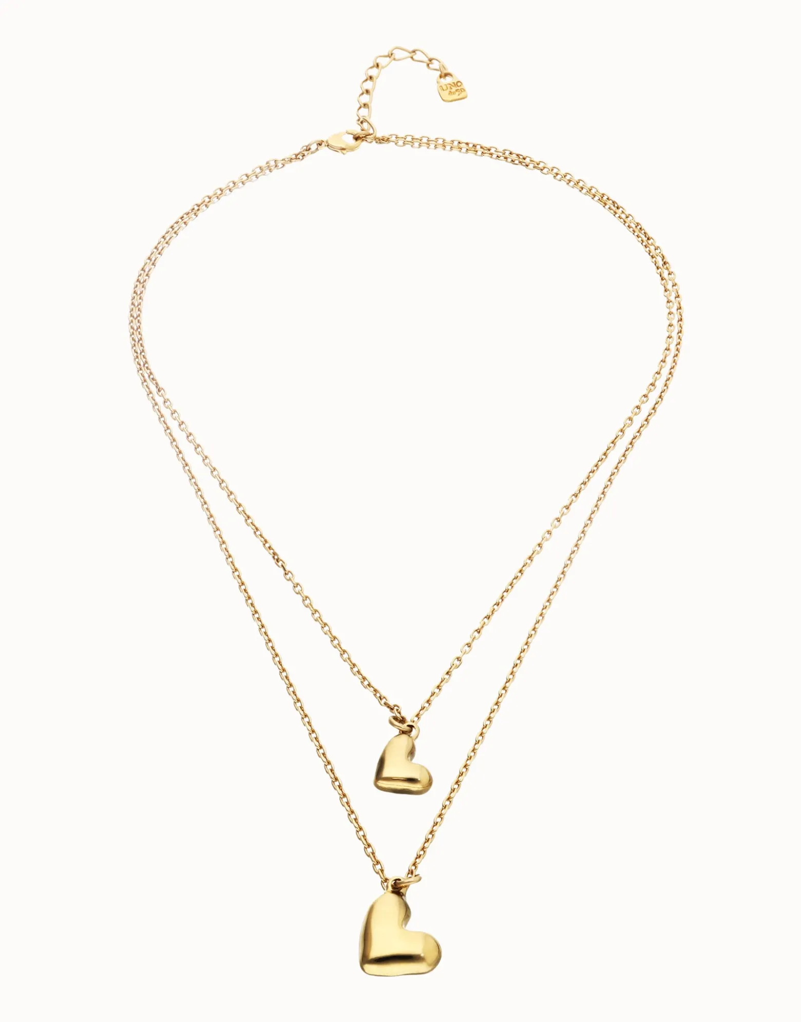 Multi strand chain necklace with two hearts