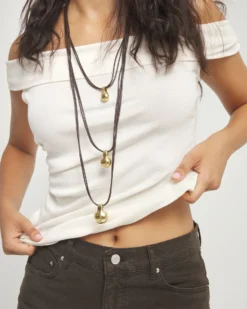 Multi strand leather necklace with three spheres
