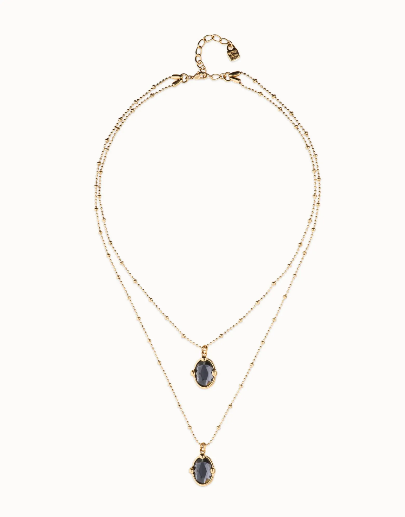 Multi strand necklace with two black oval faceted crystals