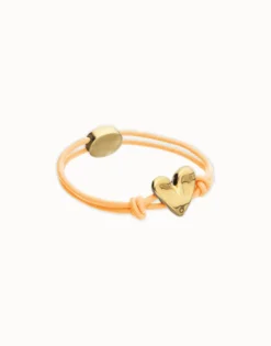 Orange elastic thread bracelet with heart