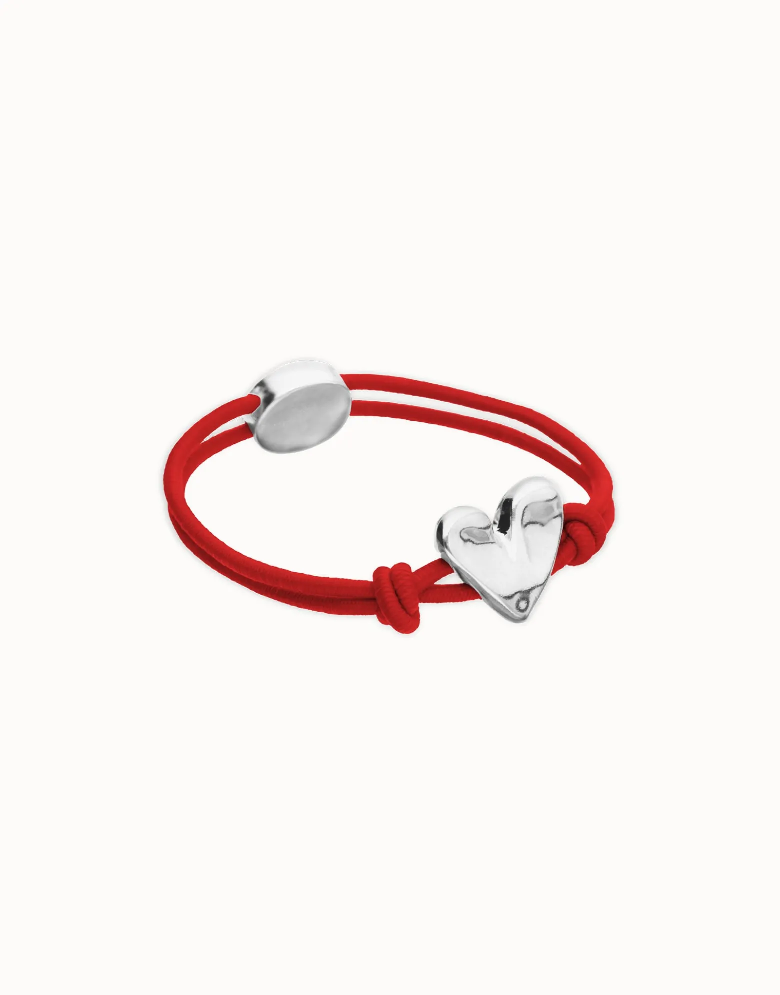 Red elastic thread bracelet with heart