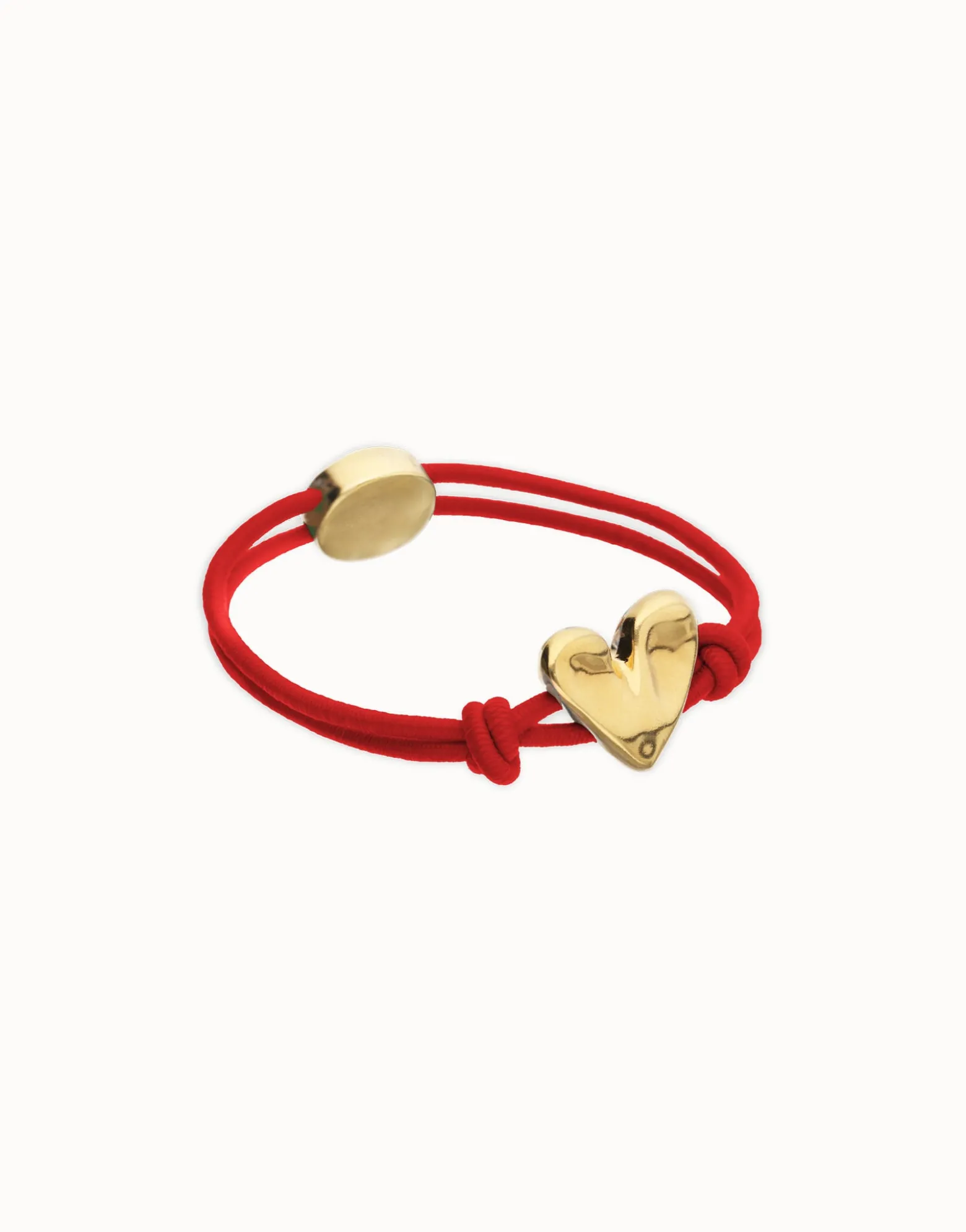 Red elastic thread bracelet with heart