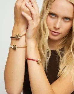 Red leather bracelet with butterfly ornament