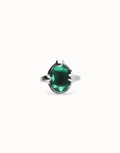Ring with green oval faceted crystal