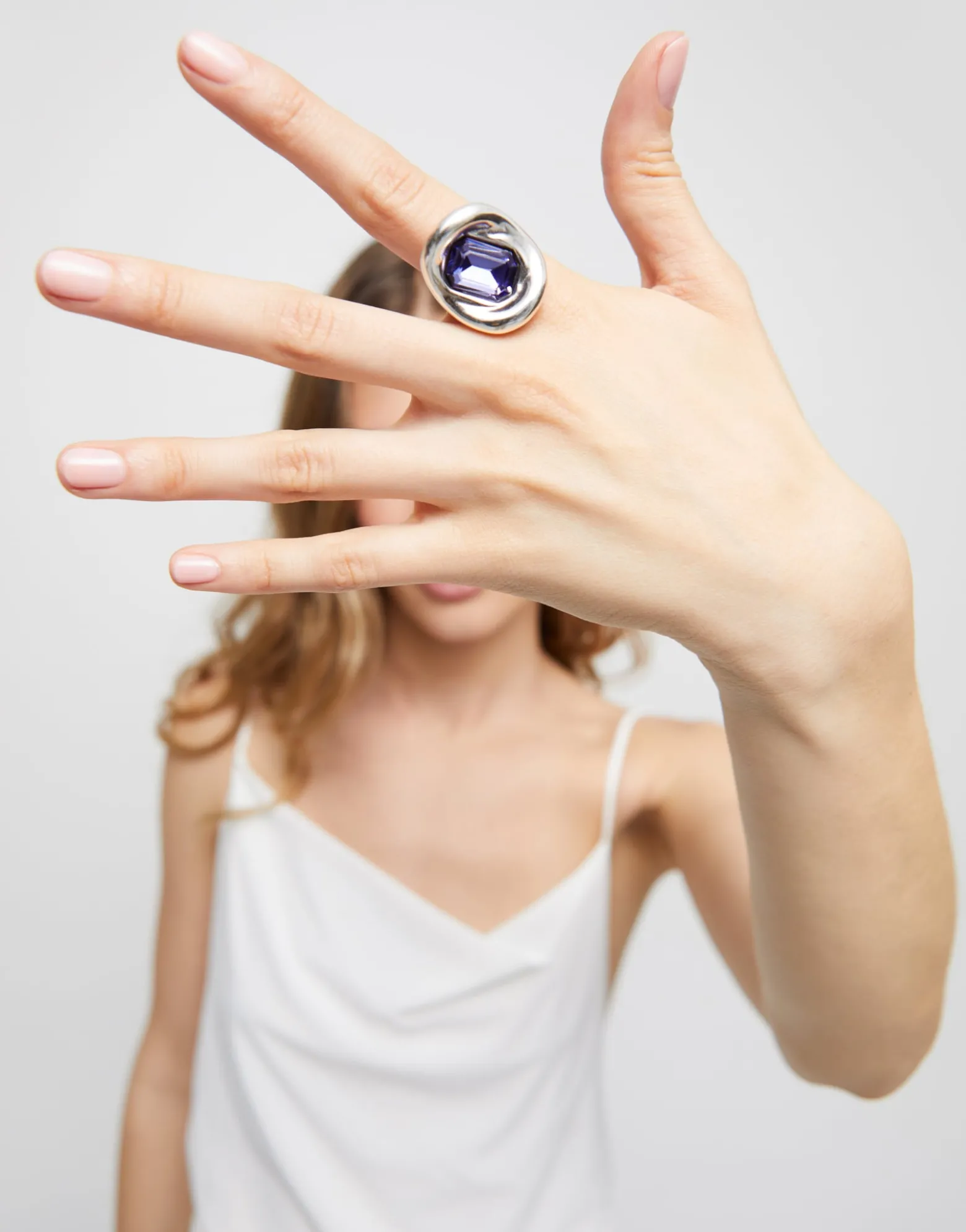 Ring with purple crystal