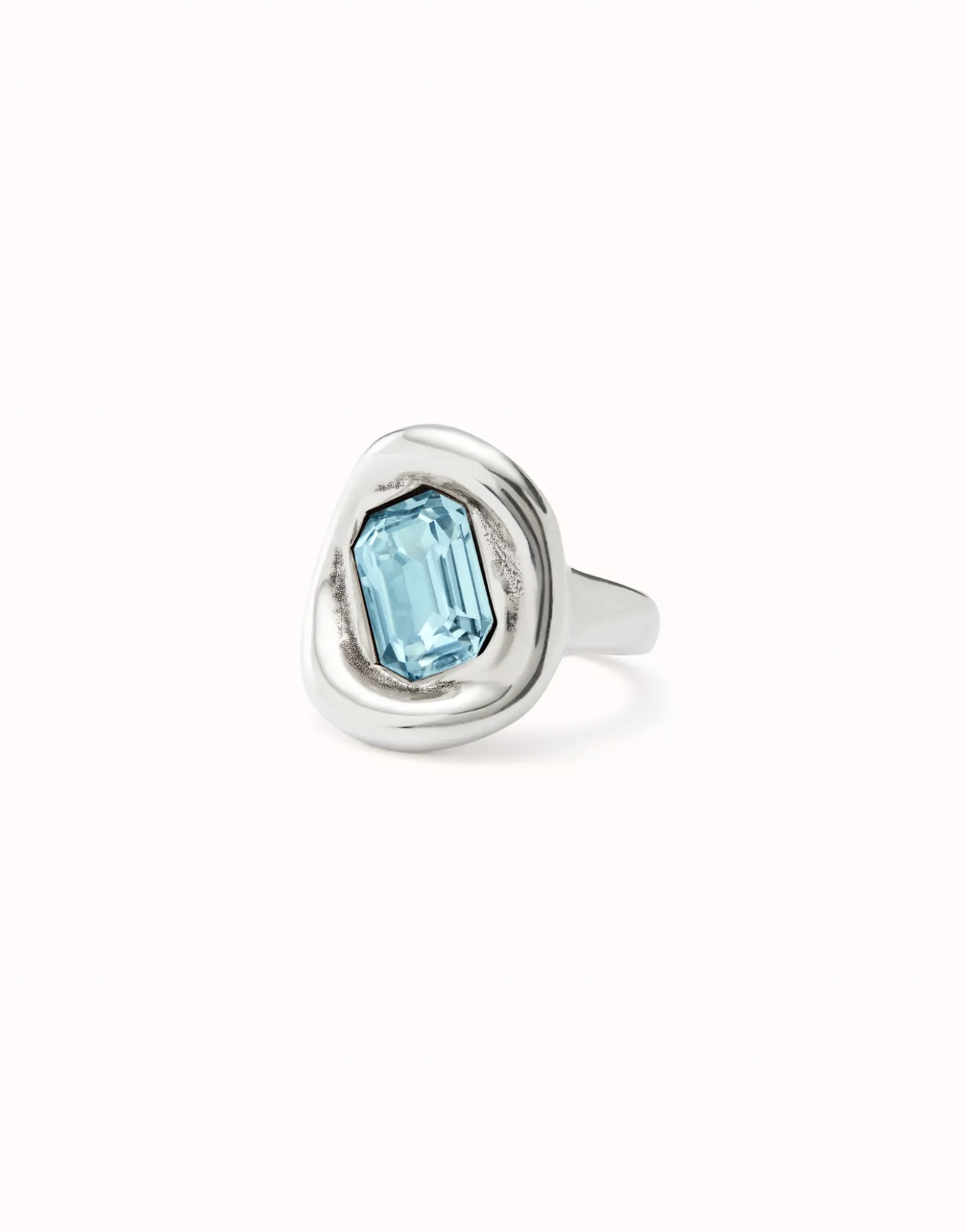 Ring with sky-blue crystal