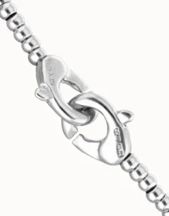 Small beads bracelet with interlocking carabiner