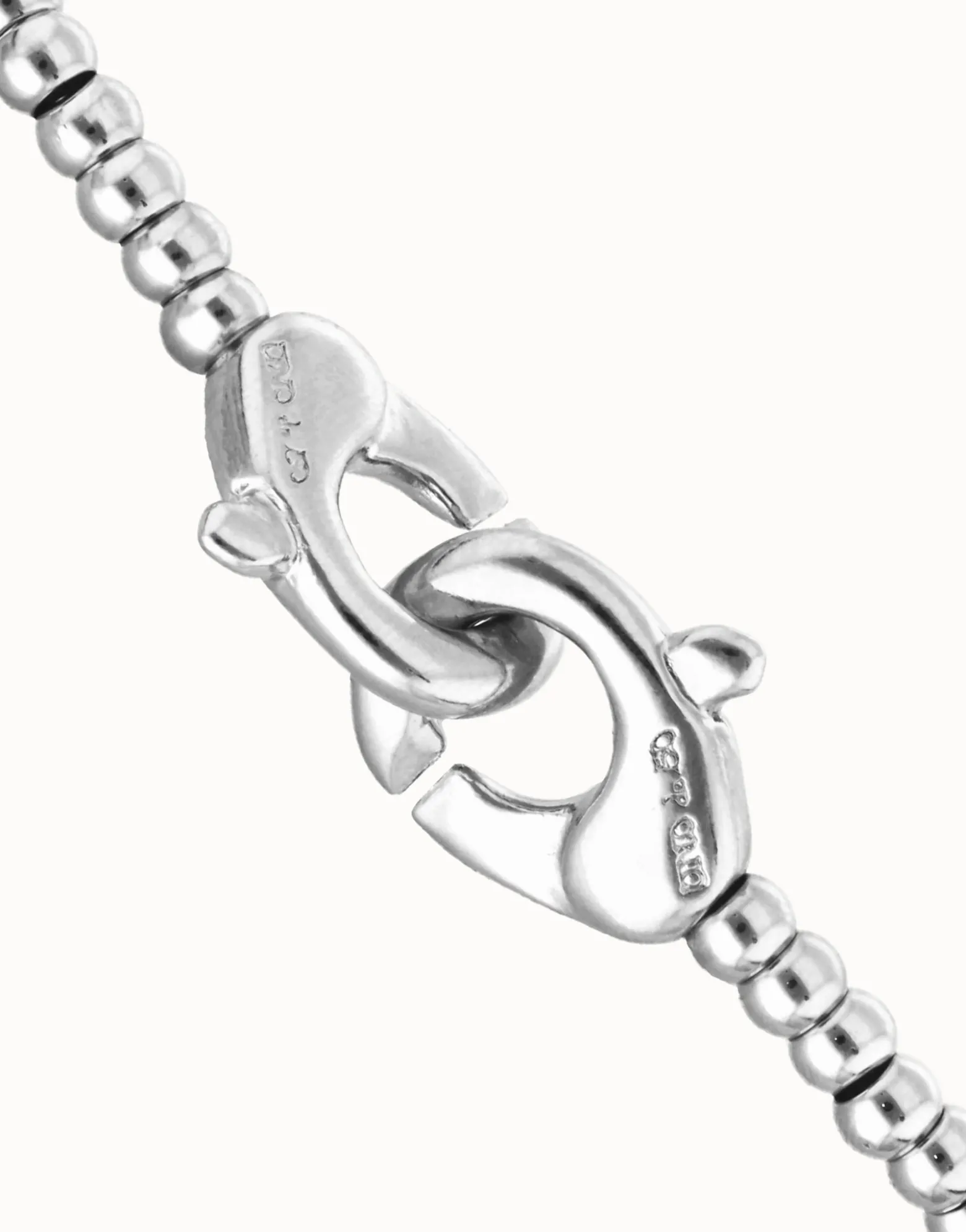 Small beads bracelet with interlocking carabiner