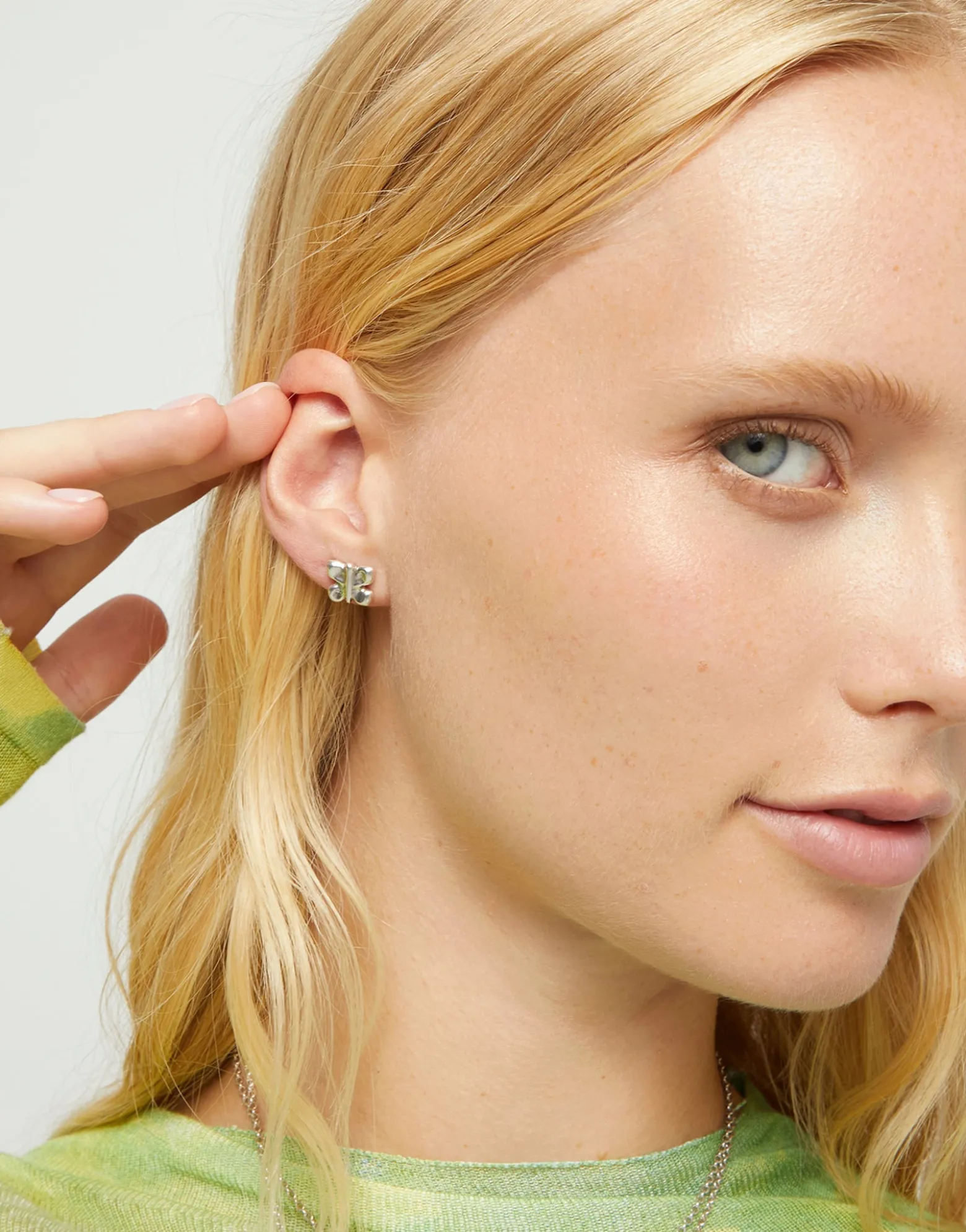 Stud earrings with a butterfly shape