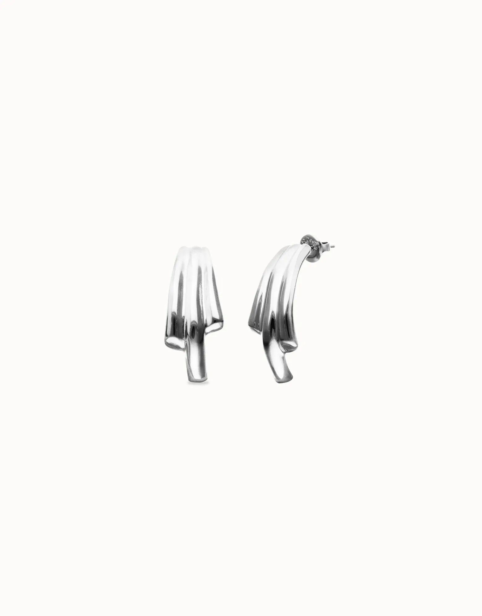 Stud earrings with elongated organic shapes