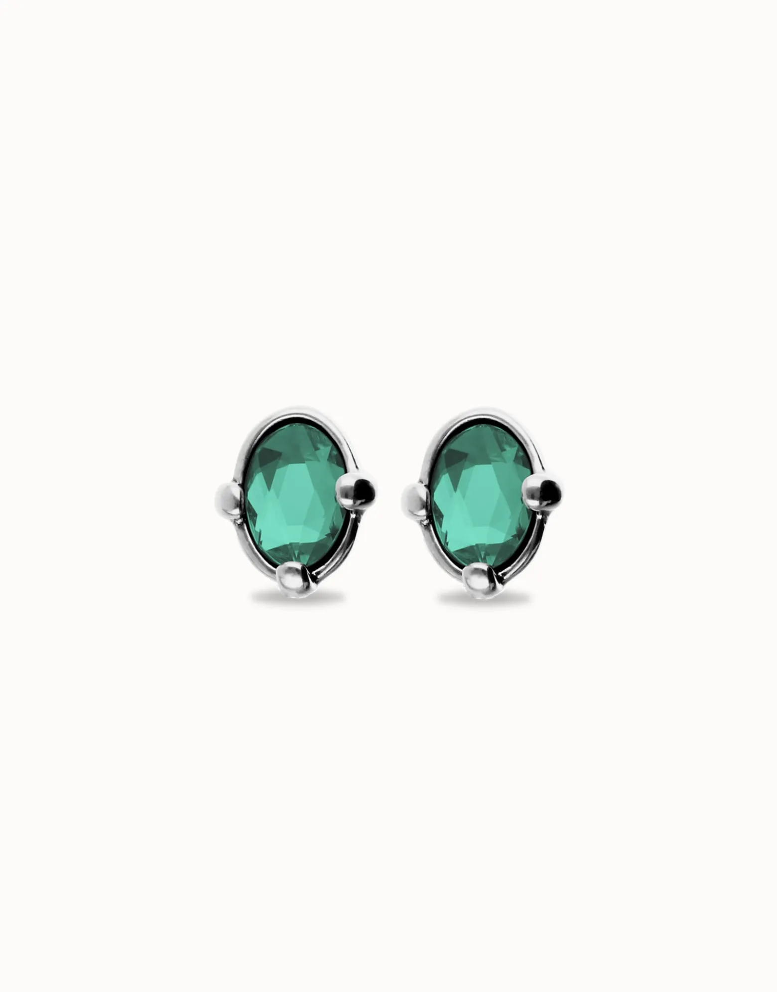 Studs with oval green faceted crystal